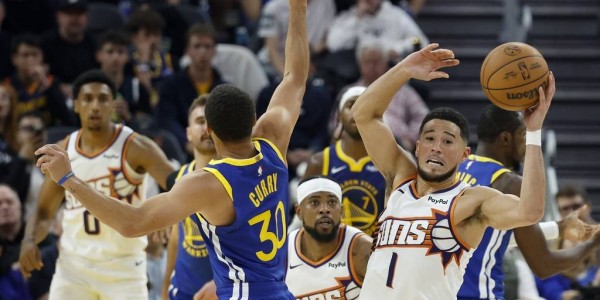 库里28+4巴特勒背伤退赛 布克38分勇士射落太阳